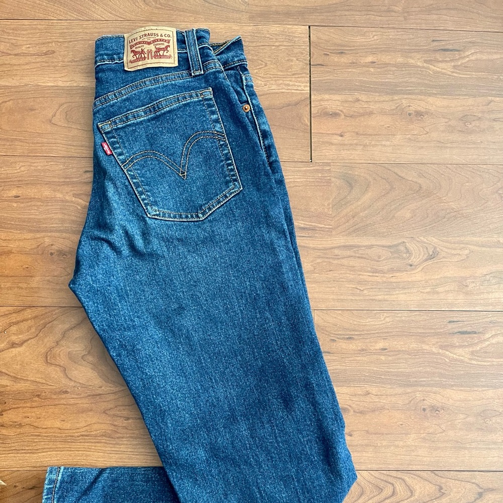 Gently used Levi wedgie straight jeans. Washed and air dried once.